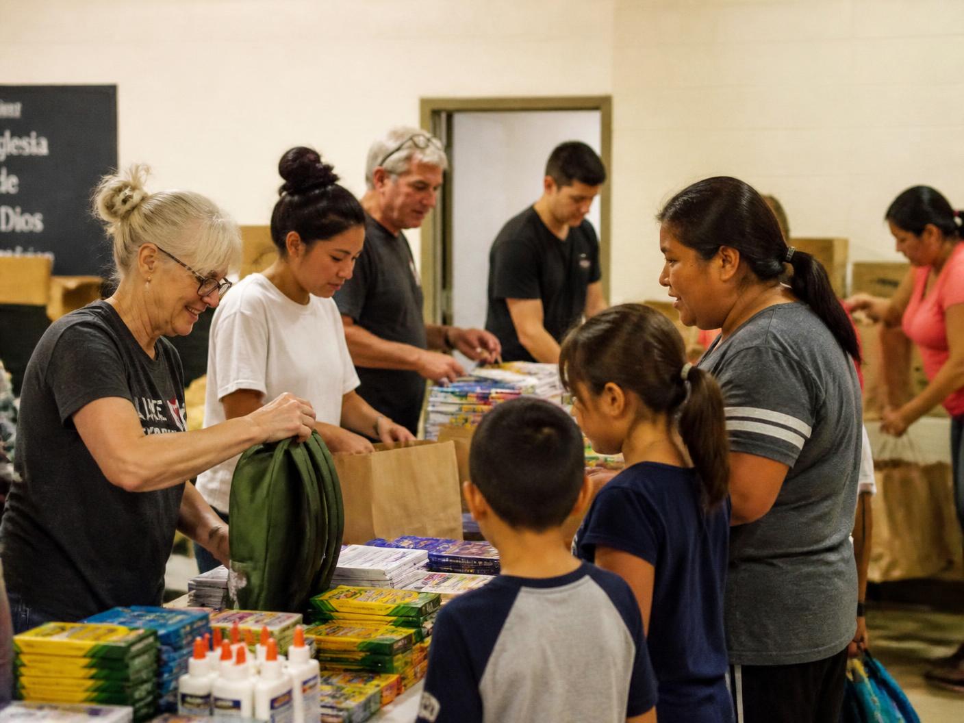 Volunteers standing together before a community outreach day